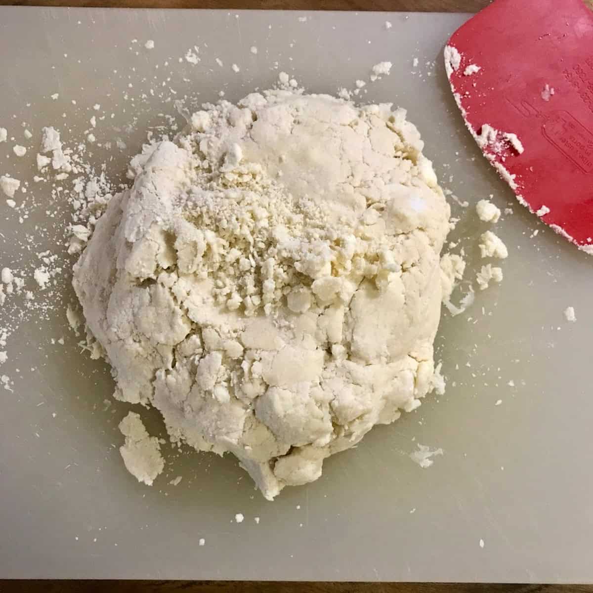 pie dough just brought together, fairly dry.  not over mixing = flaky crust