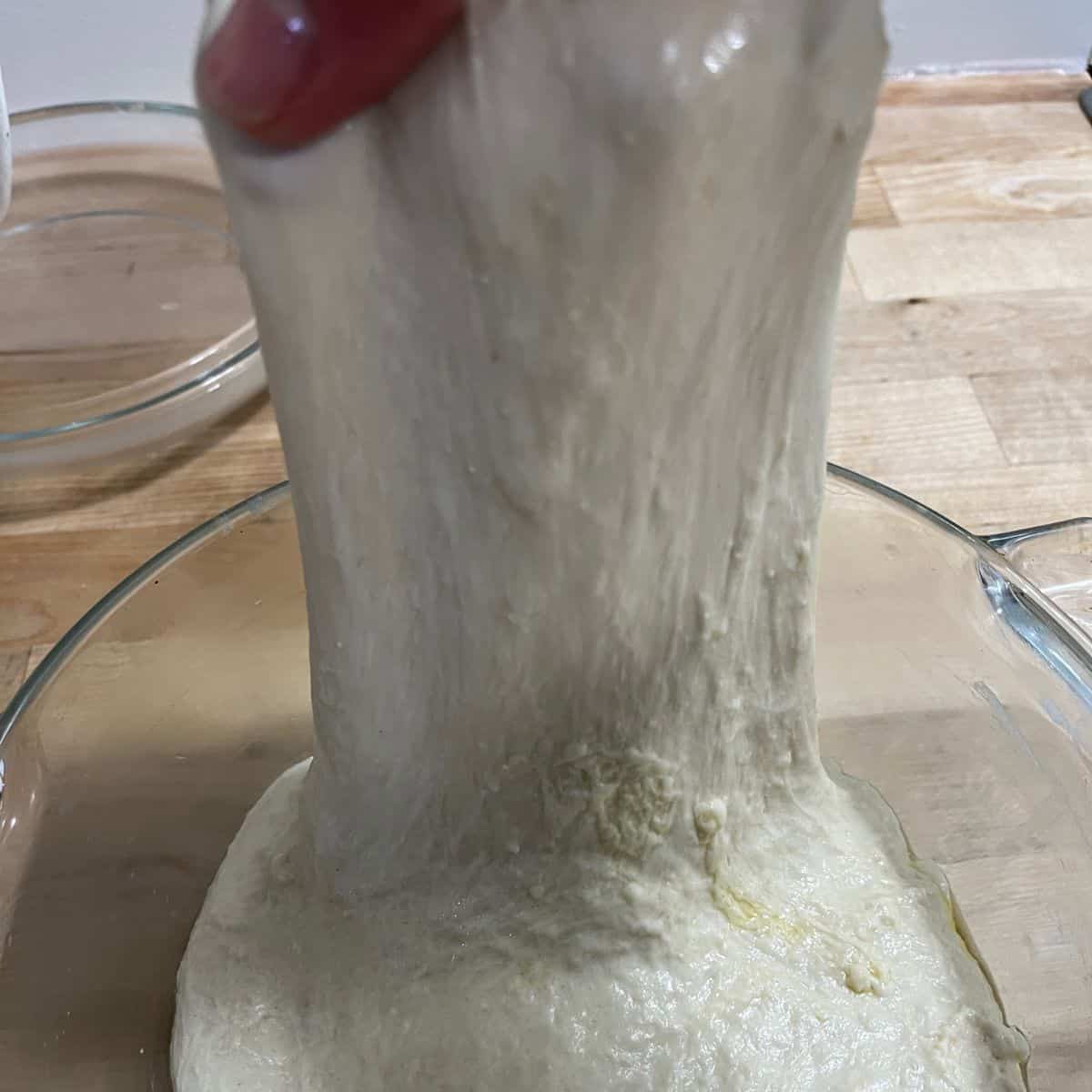 Stretching dough.
