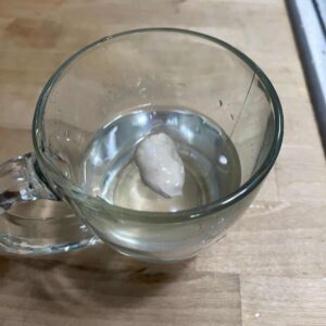 Dough floating in water.