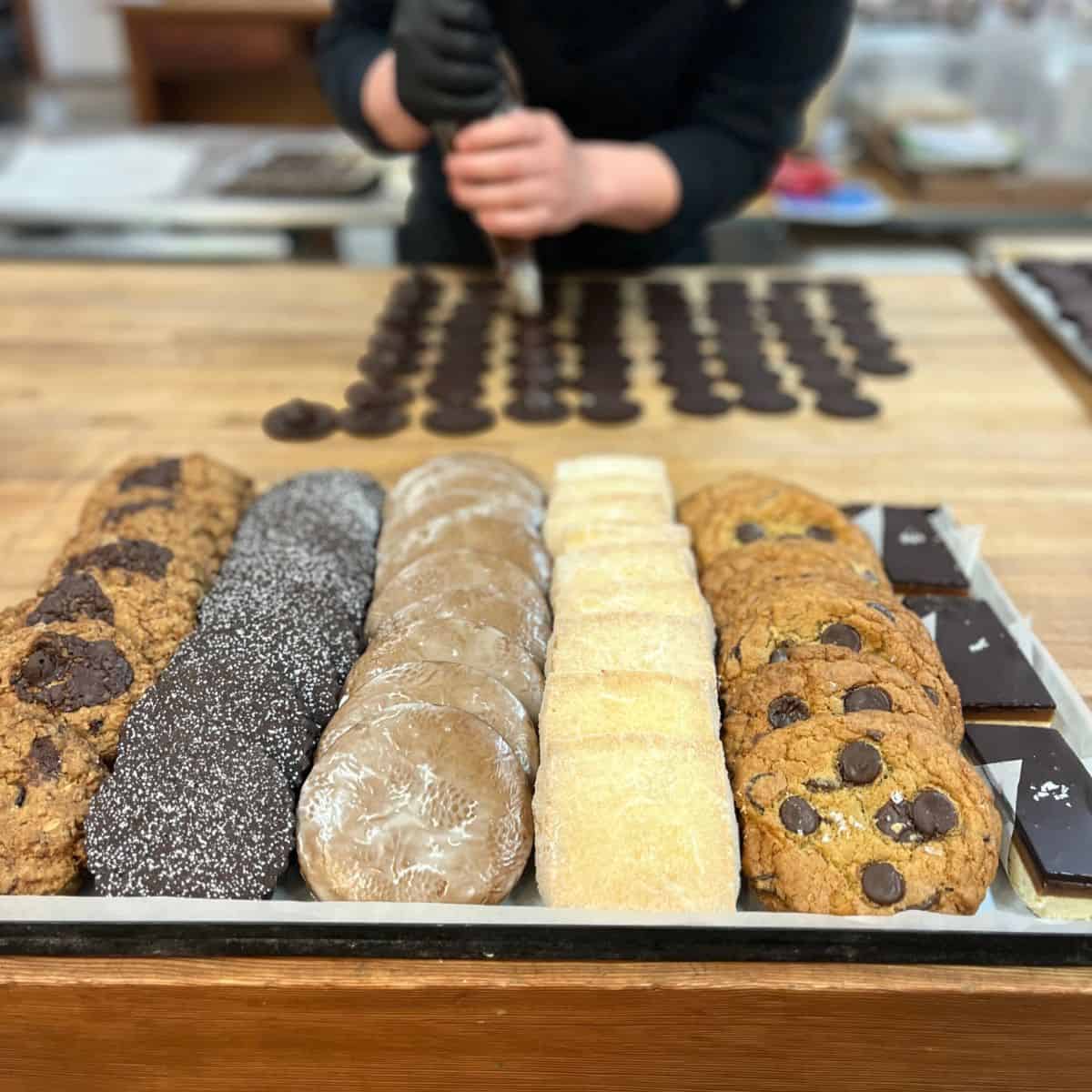 a variety of cookies on a tray.