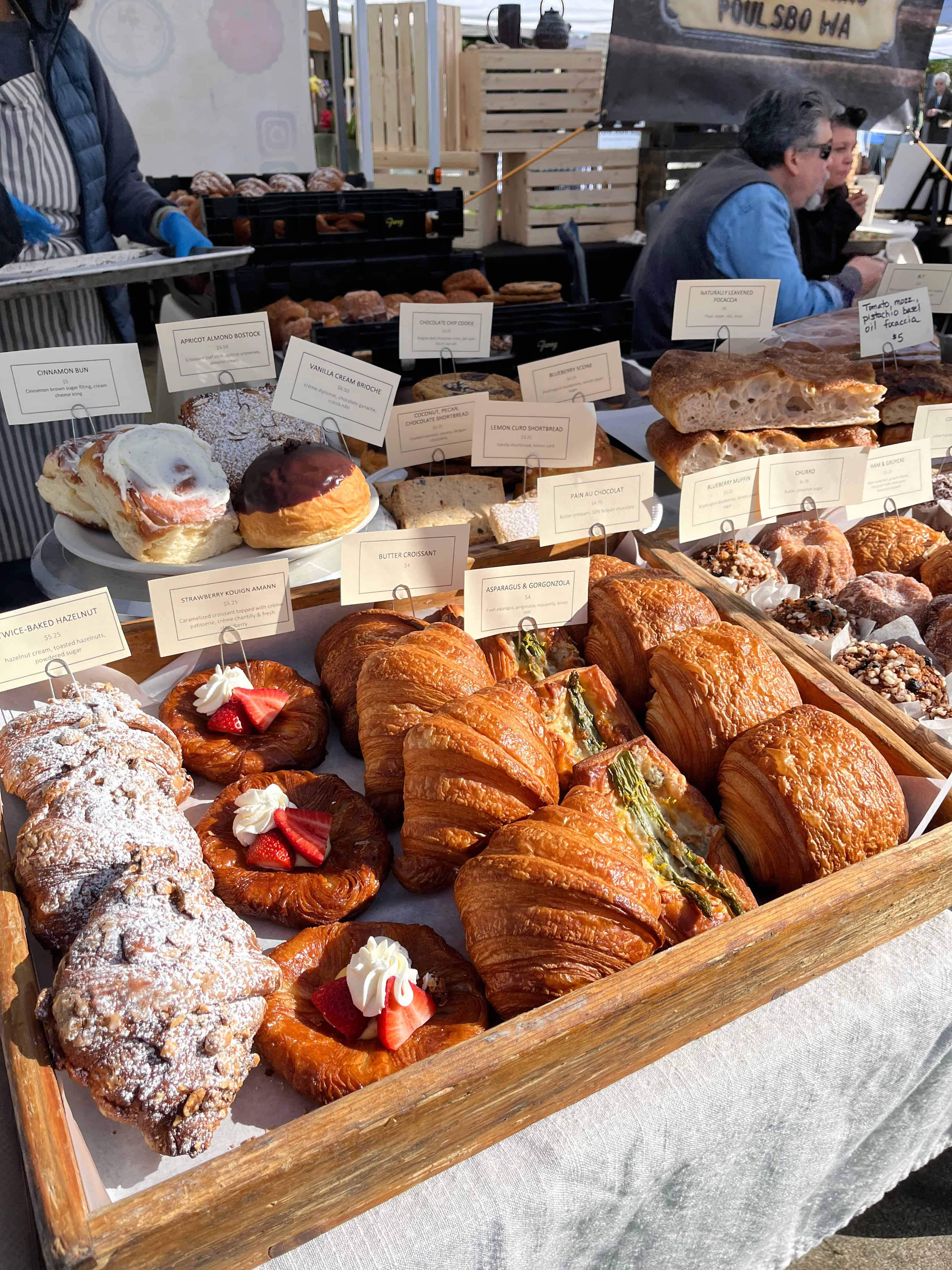 Pastries being sold at market.  Packaging, presentation, aroma, consistency, service, and reliability all shape perceived value.