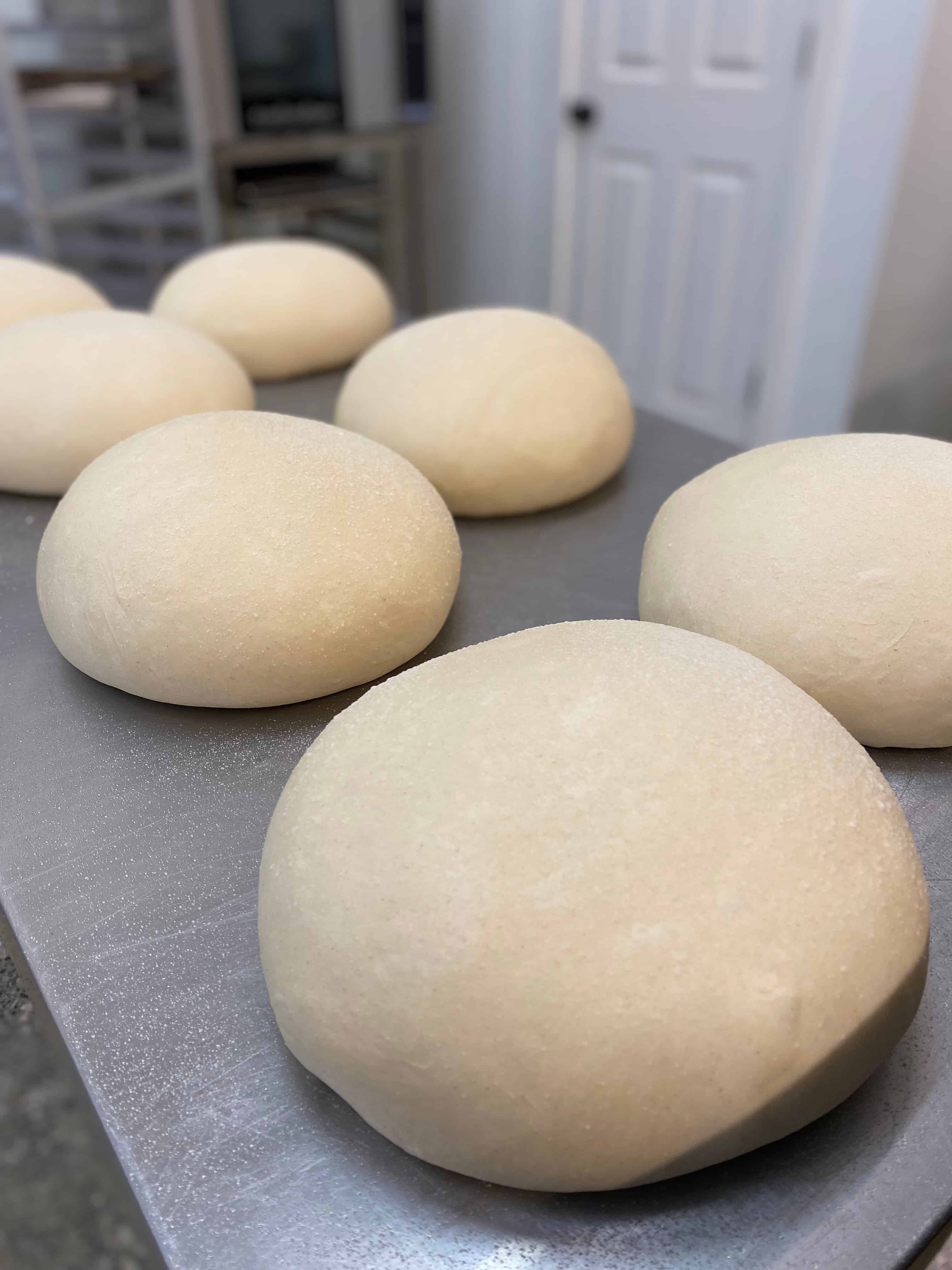 Croissant dough resting on a bench