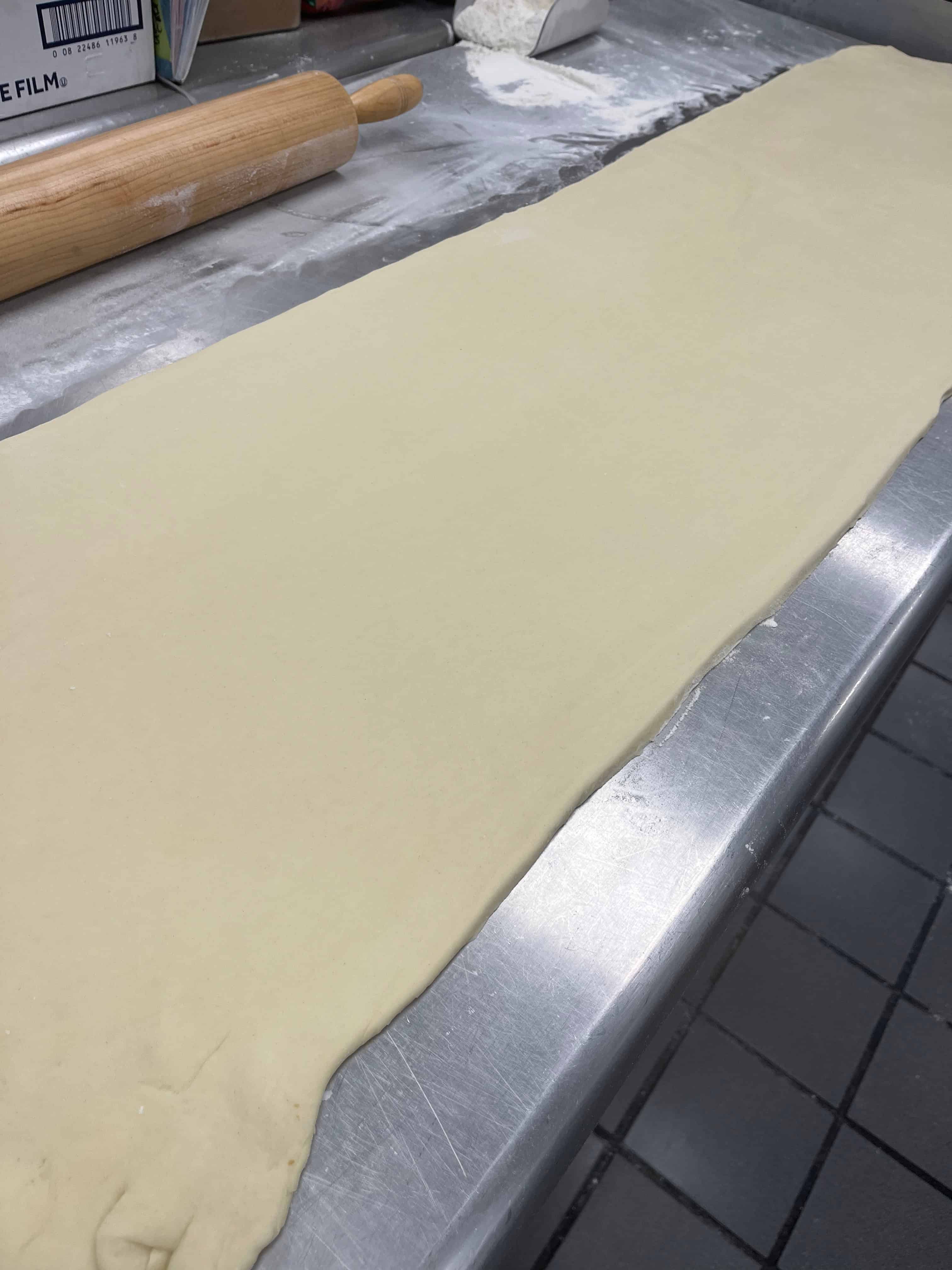 cinnamon roll dough rolled out