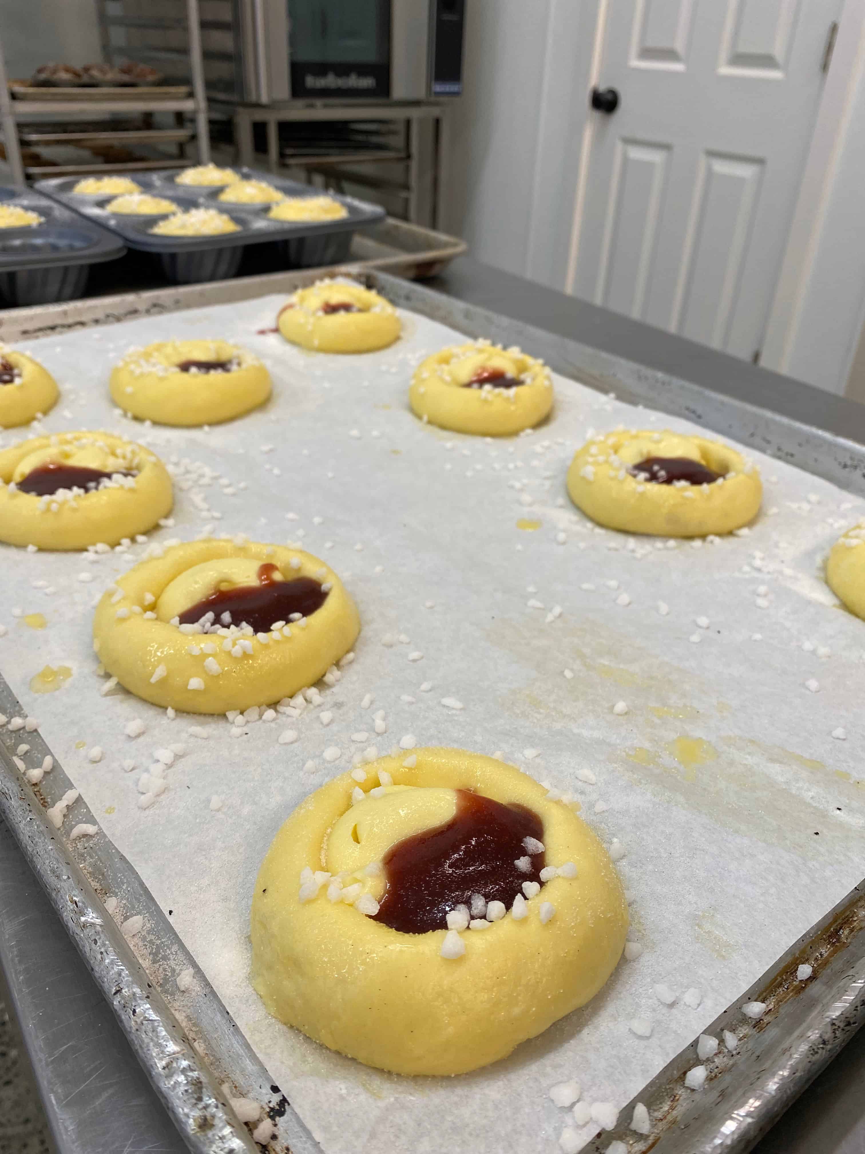 Brioche buns fully proofed and ready for the oven