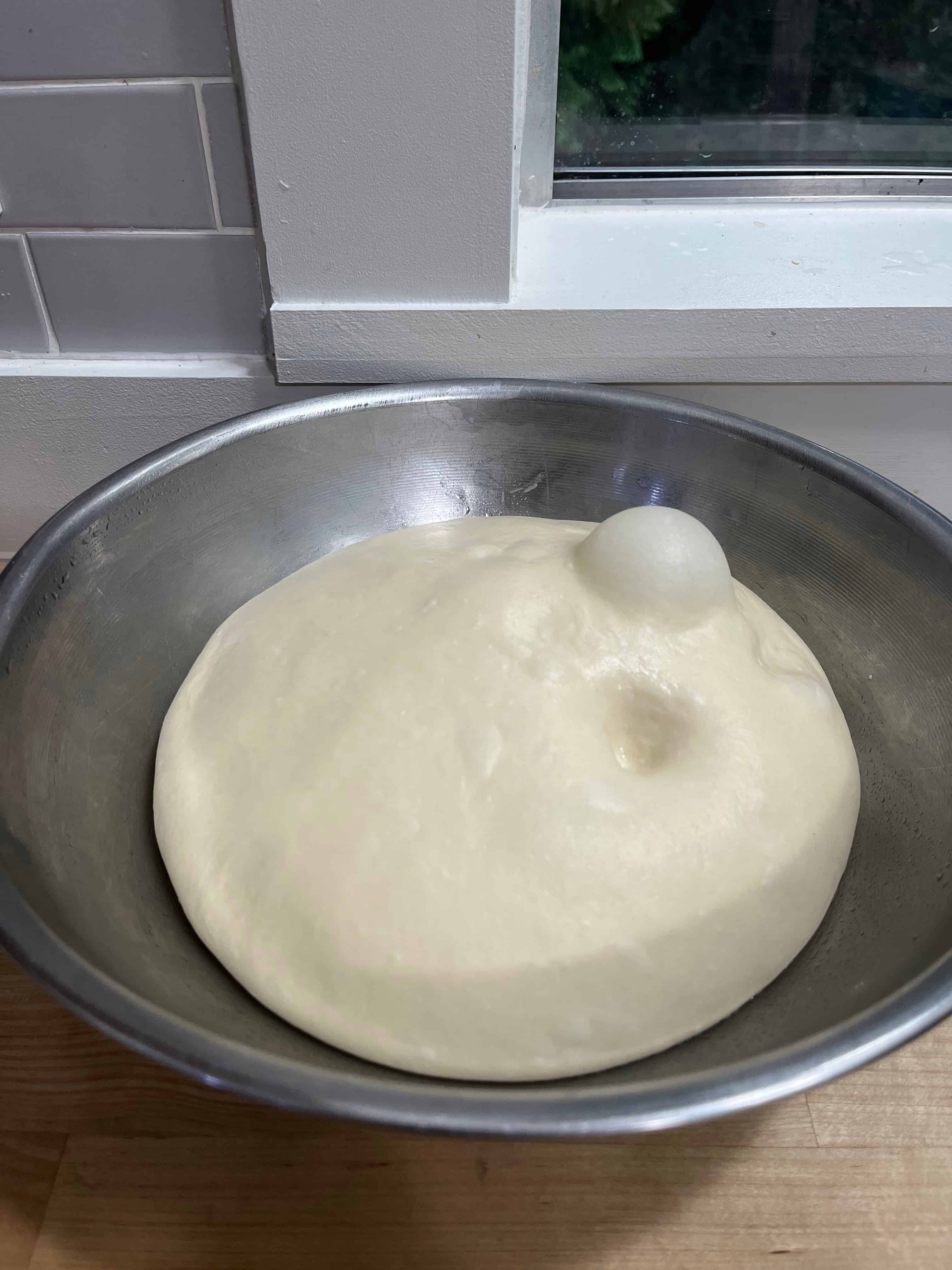 Poke test on well fermented dough leaves an indentation.