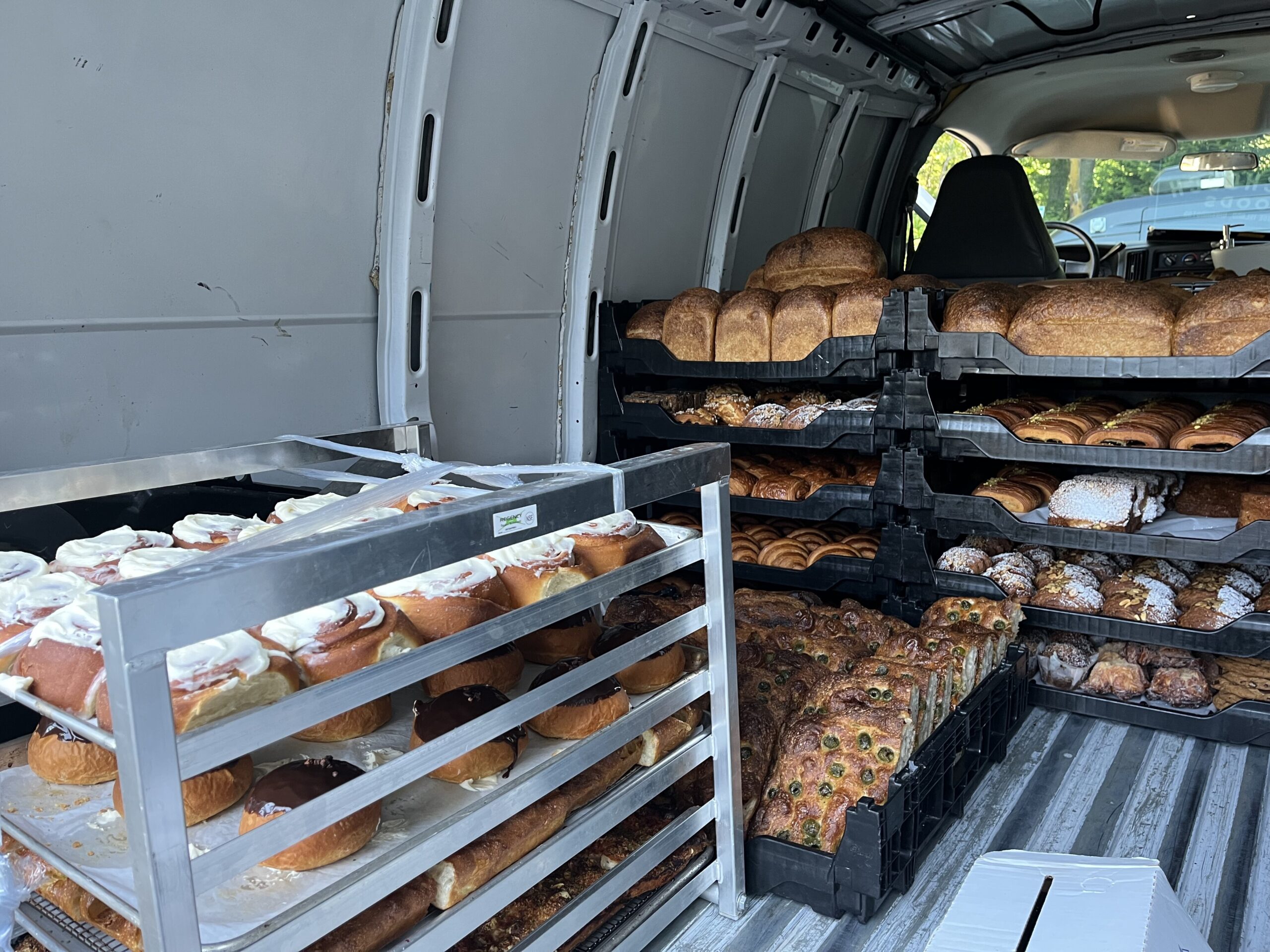 Transporting baked goods in a van.