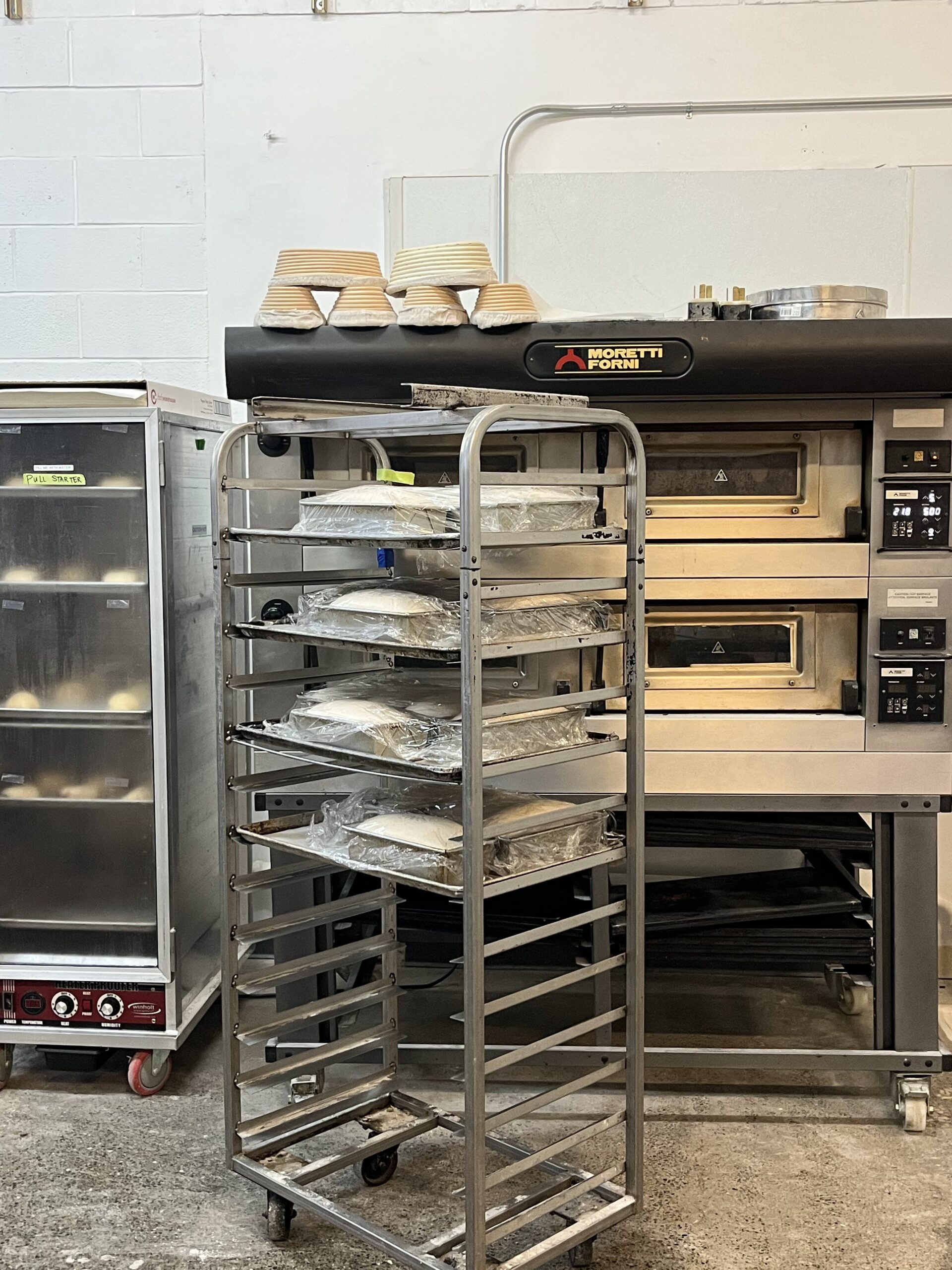 Bakery equipment - deck oven, proofer and speed rack.