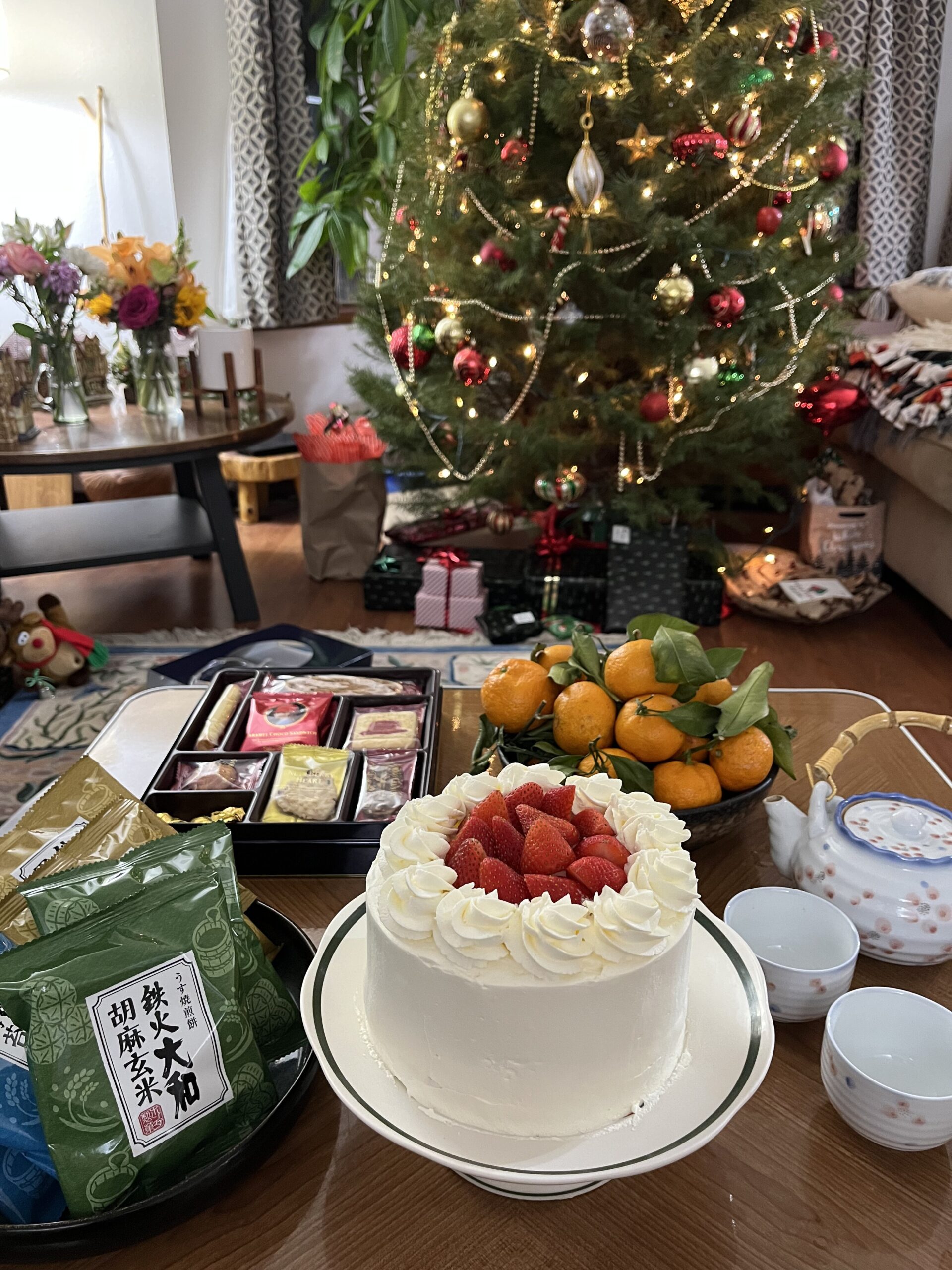Cake in front of Christmas tree