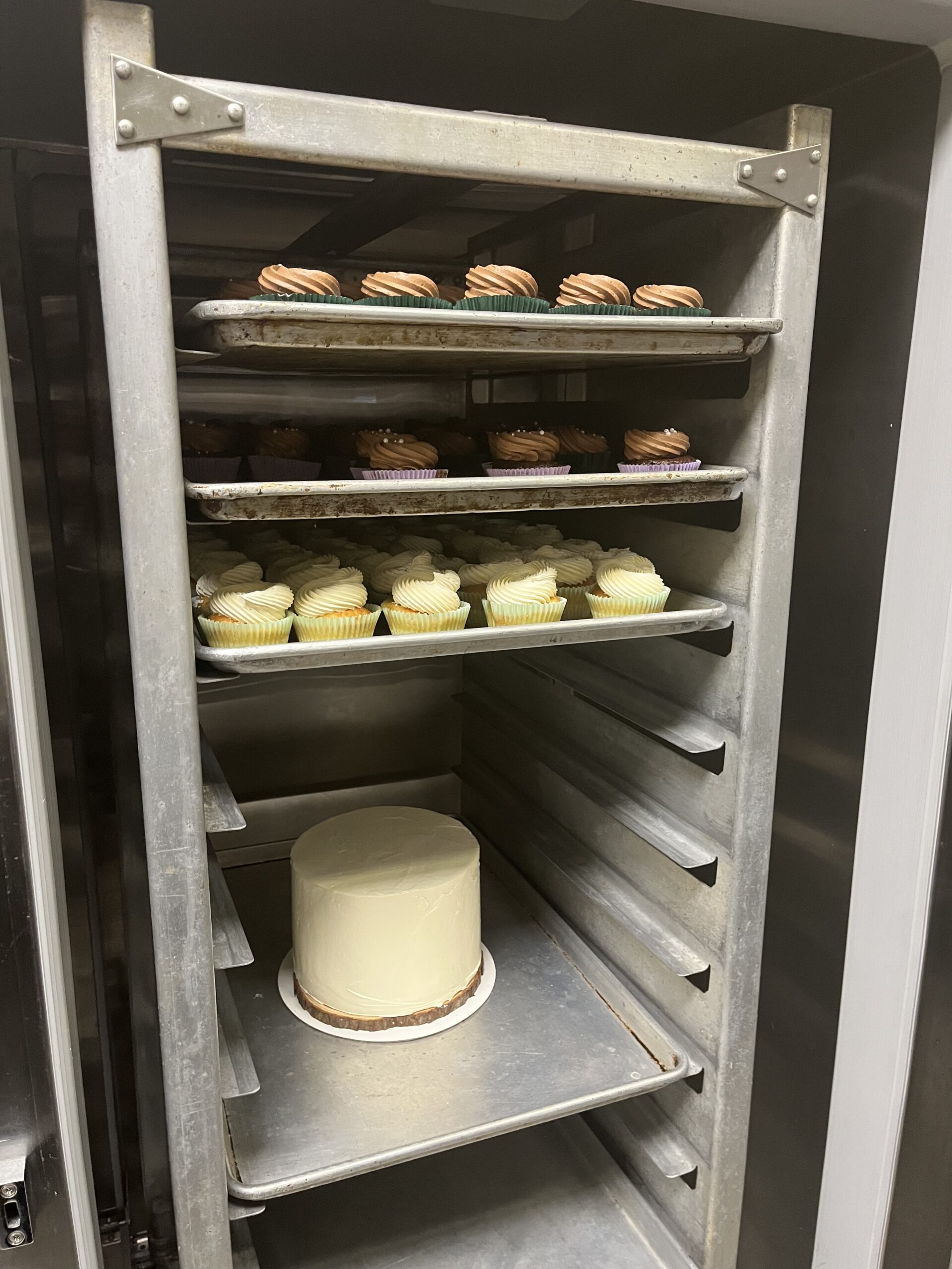 Cupcakes on rack ready to be boxed up